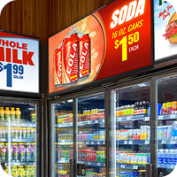 Digital signage above store coolers